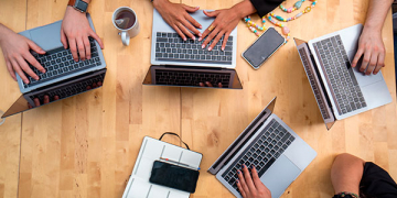 People working at their computers